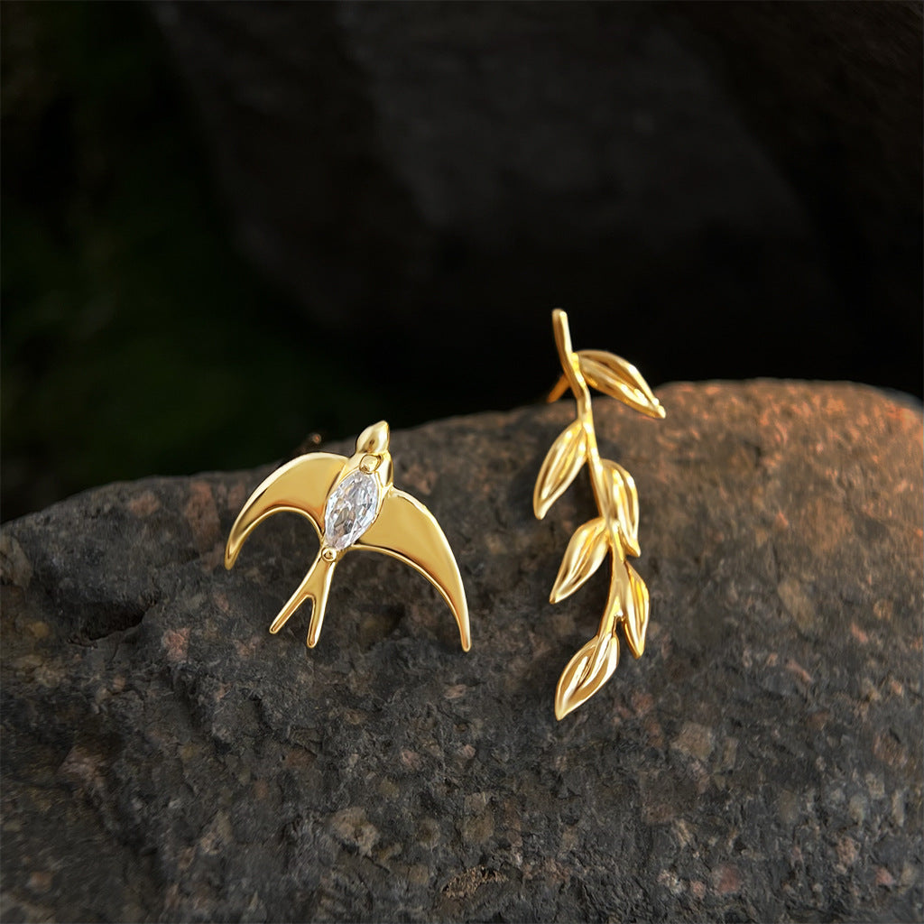Avani | Gold Bird and Leaf Asymmetrical Stud Earrings